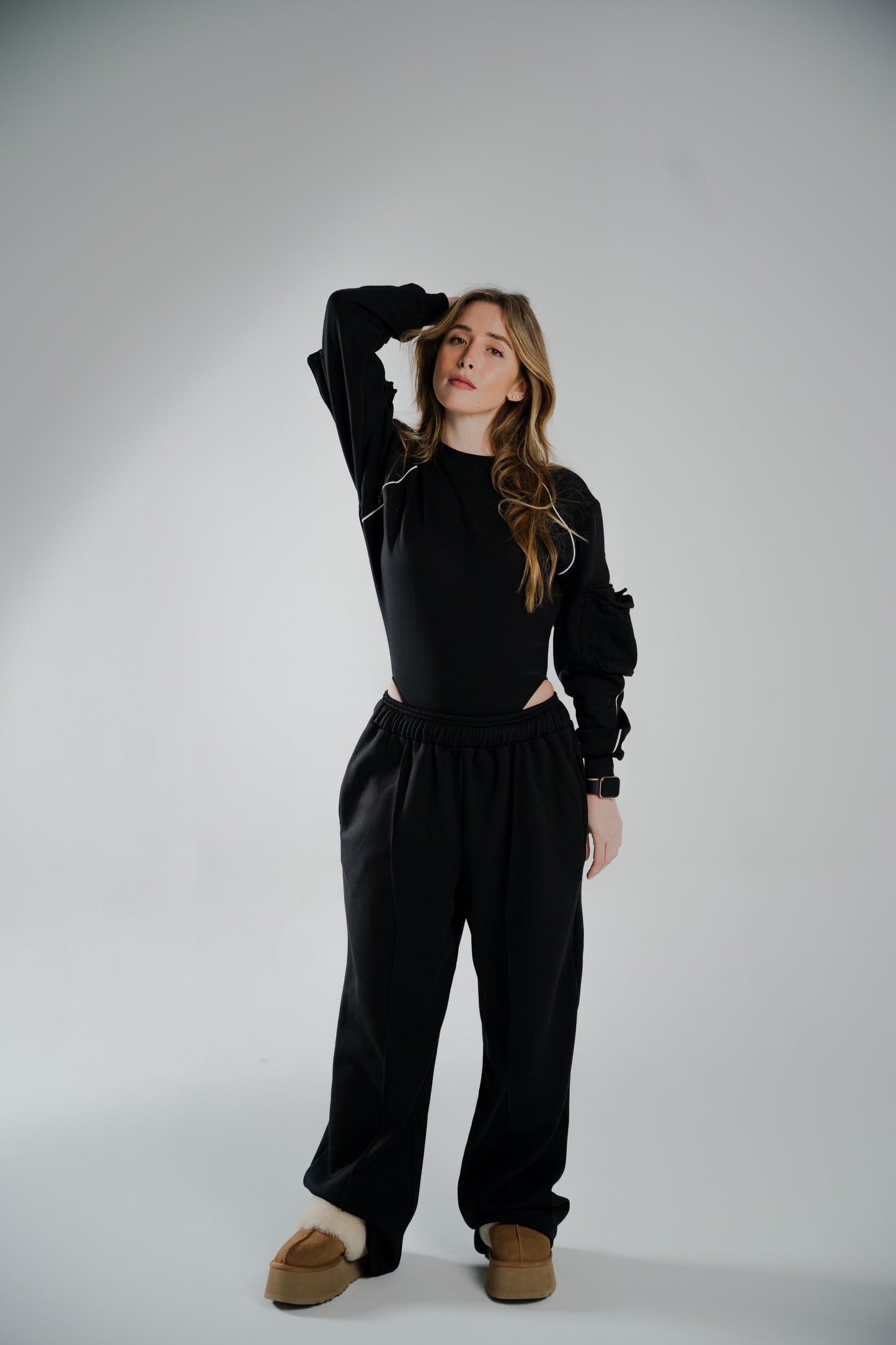 BLACK COTTON BODYSUIT WTH FUR-LINED INTERIOR