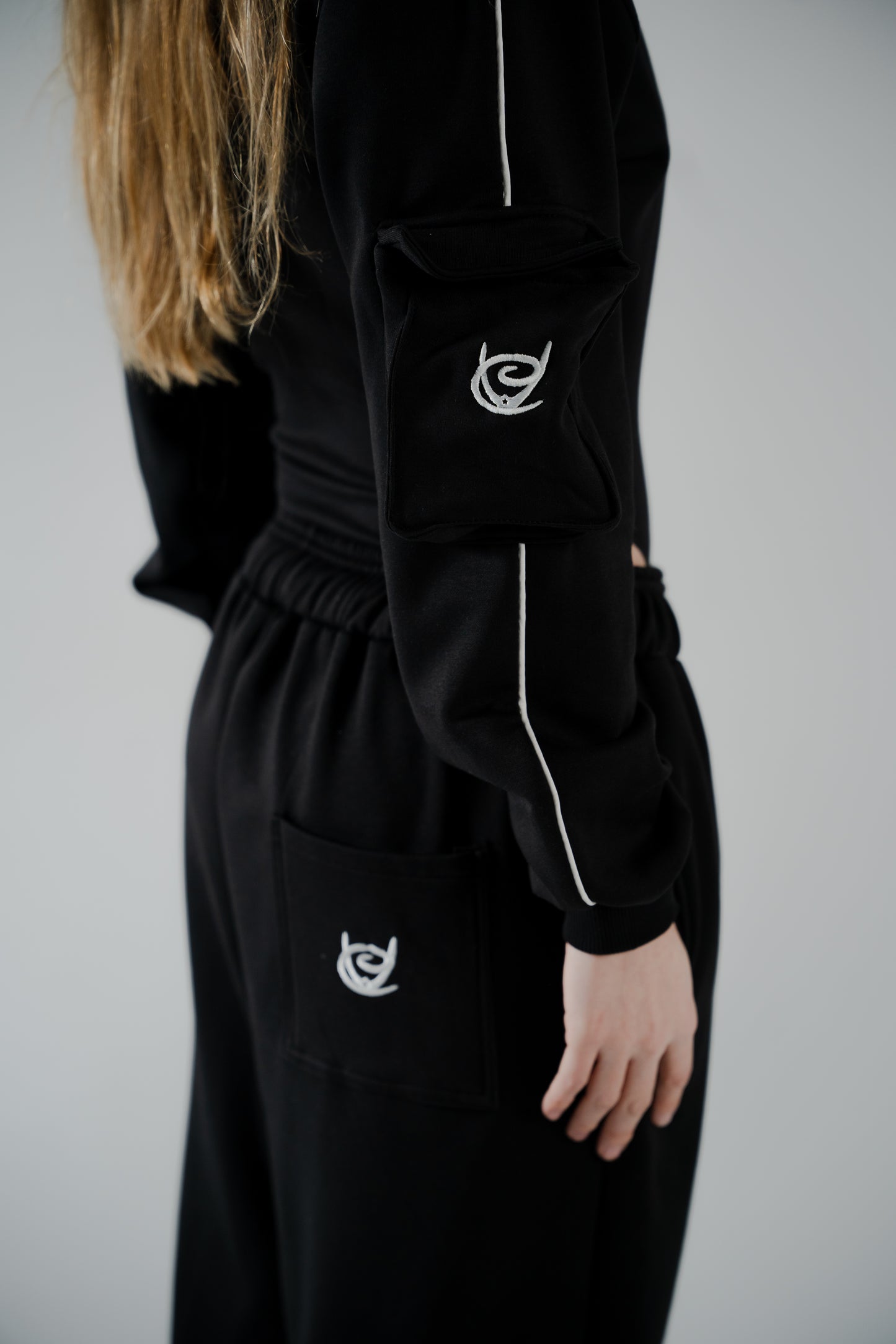 BLACK COTTON BODYSUIT WTH FUR-LINED INTERIOR