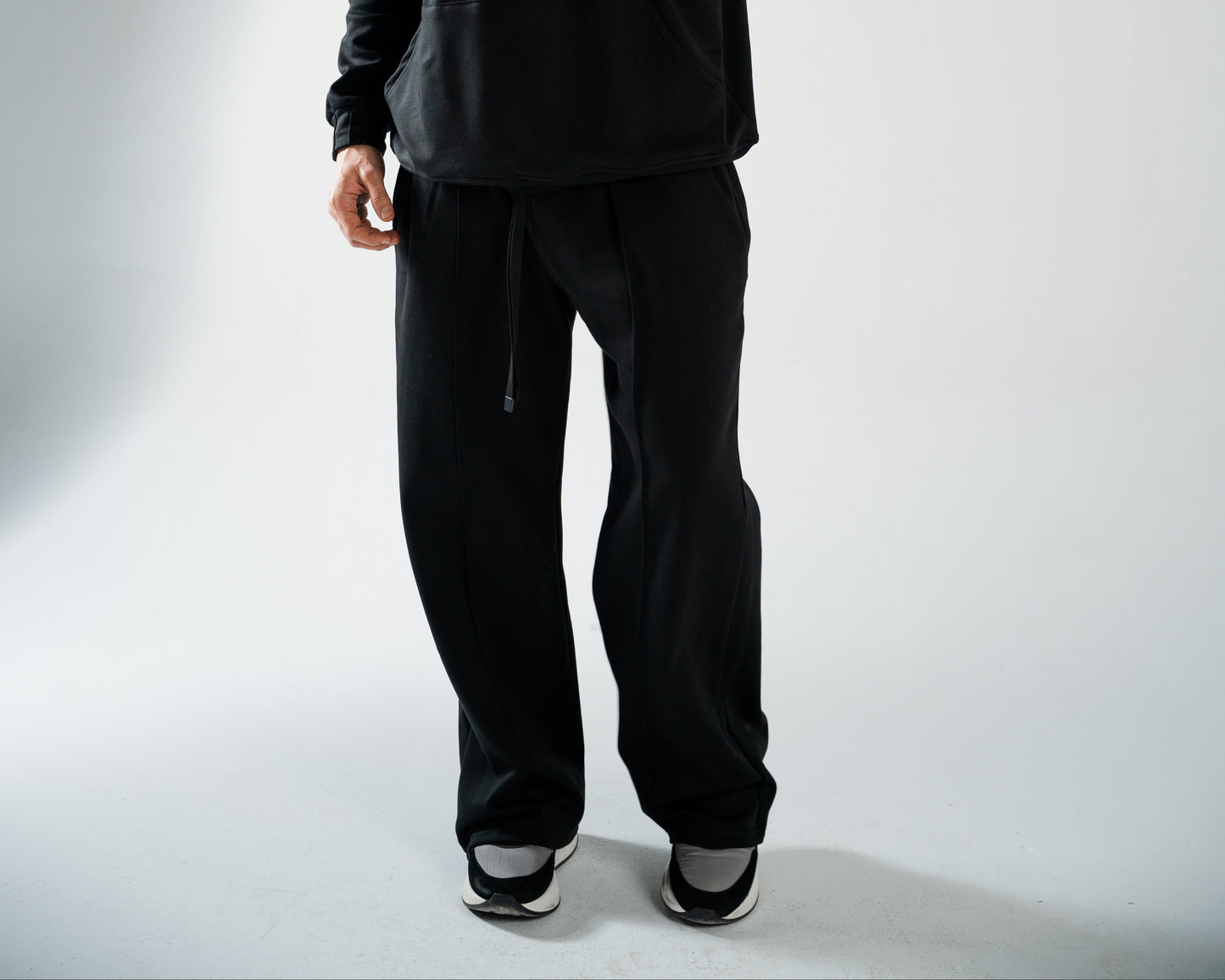BLACK COTTON SWEATPANTS WITH FUR-LINED INTERIOR