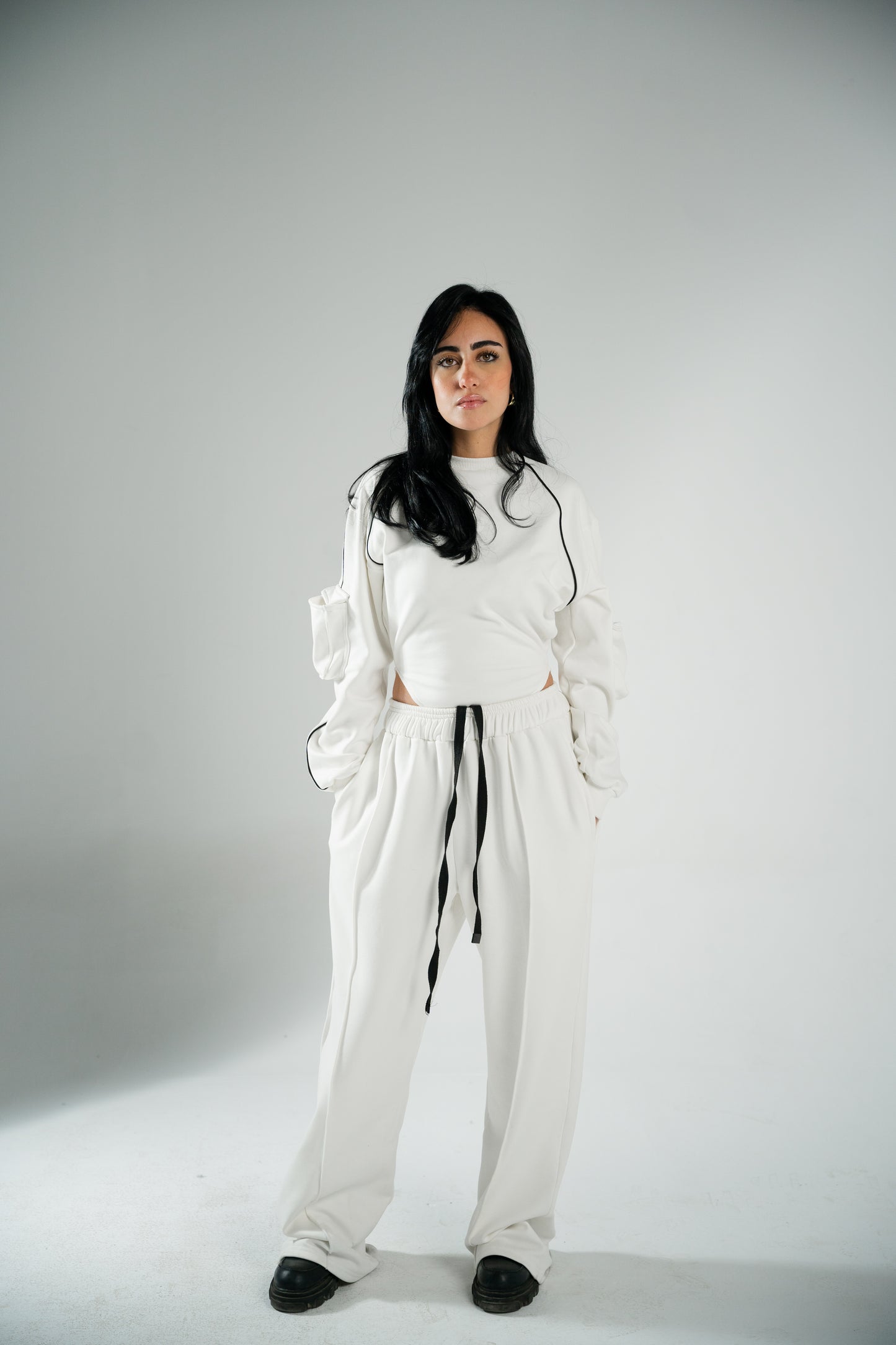 WHITE COTTON BODYSUIT WITH FUR-LINED INTERIOR