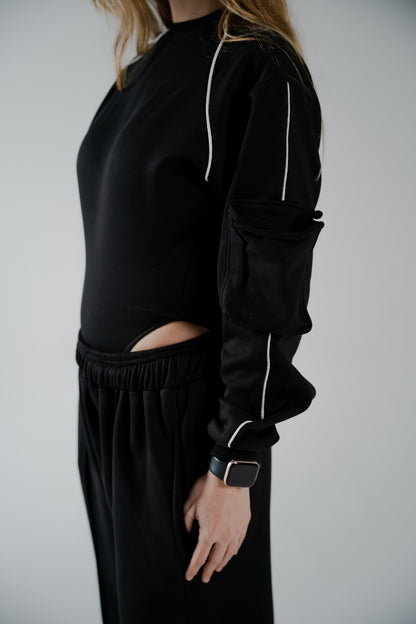 BLACK COTTON BODYSUIT WTH FUR-LINED INTERIOR